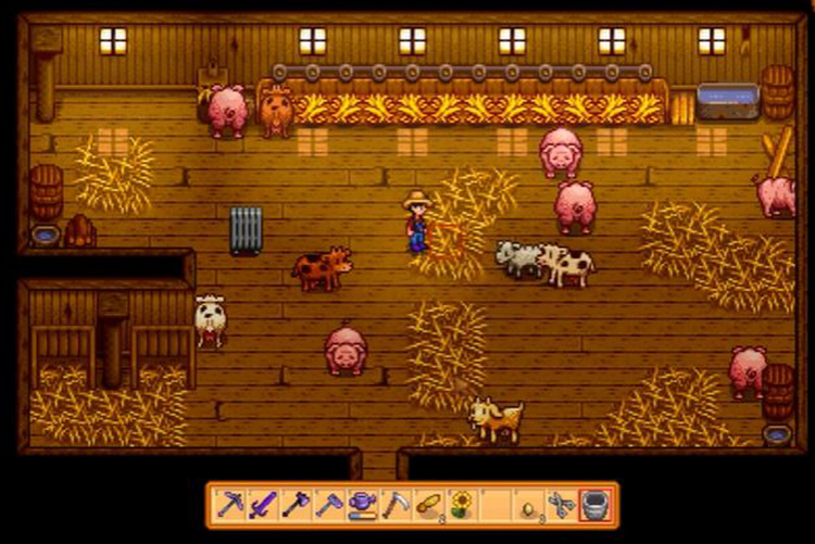 Pigs and cows in a deluxe barn in Stardew Valley