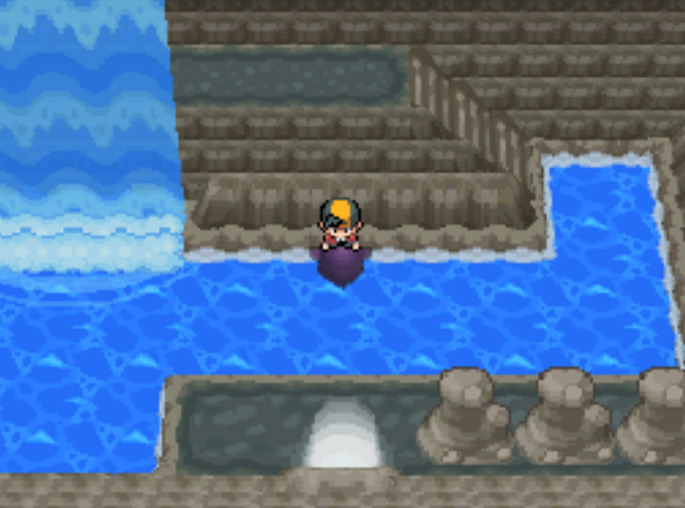 The right side of the cave containing an exit and a set of stairs / Pokemon HGSS