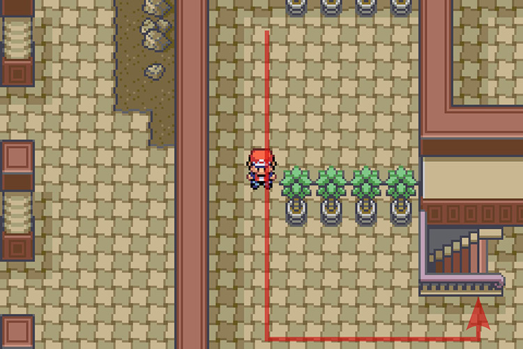 Taking the stairs leading to the mansion’s basement. / Pokémon Radical Red