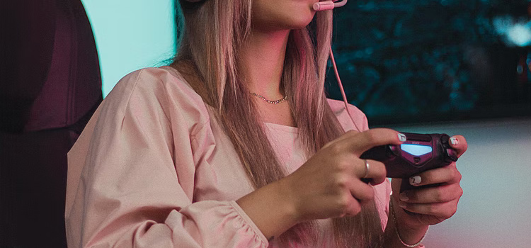 Female gamer with headset & controller