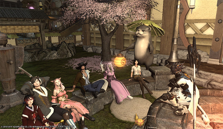 Group of Free Company characters sitting in FFXIV