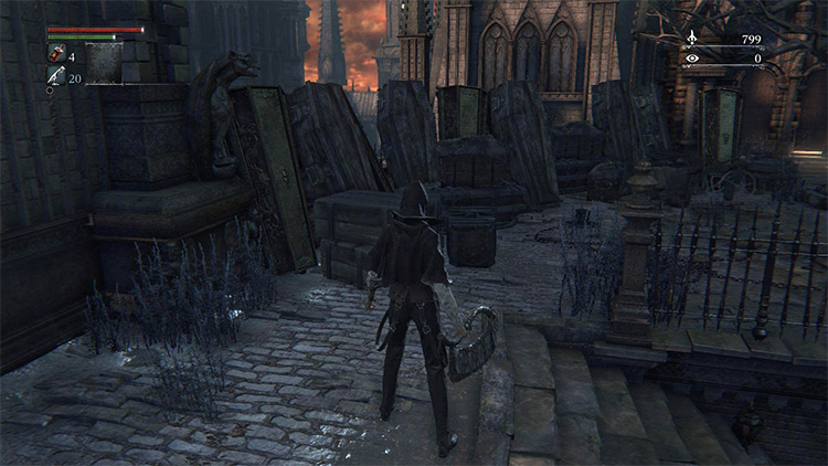 The pile of destructible items that hide the gap in the railings / Bloodborne