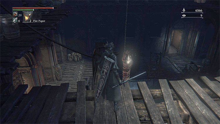 The Saw Spear on a body above the Yharnam Sewers / Bloodborne