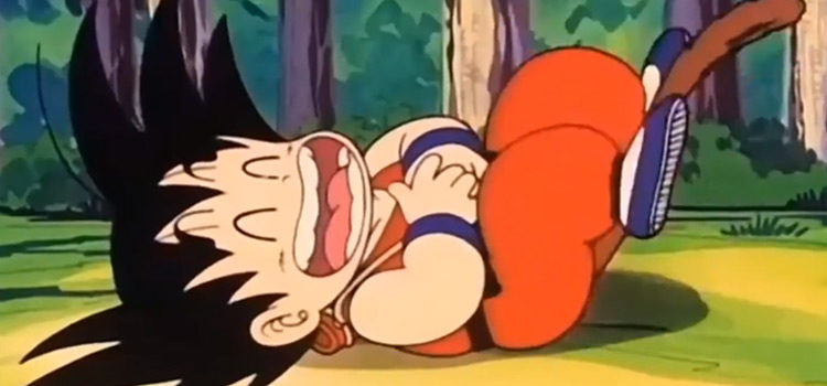 Goku laughing on the ground