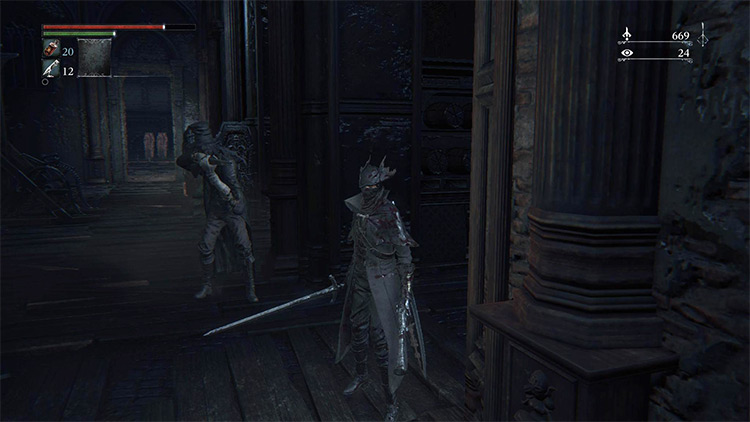 The Rifleman, with the door outside behind him / Bloodborne