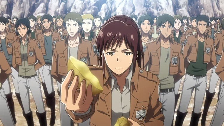 Sasha reluctantly sharing her potato in Attack On Titan