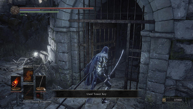 Using the Tower Key to unlock the door outside of Firelink Shrine / Dark Souls III