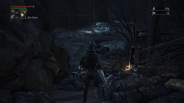Walking past the lantern at the bottom of the steps will trap you in the arena / Bloodborne