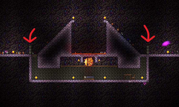 Example of where to place the dart traps, indicated by the arrows / Terraria