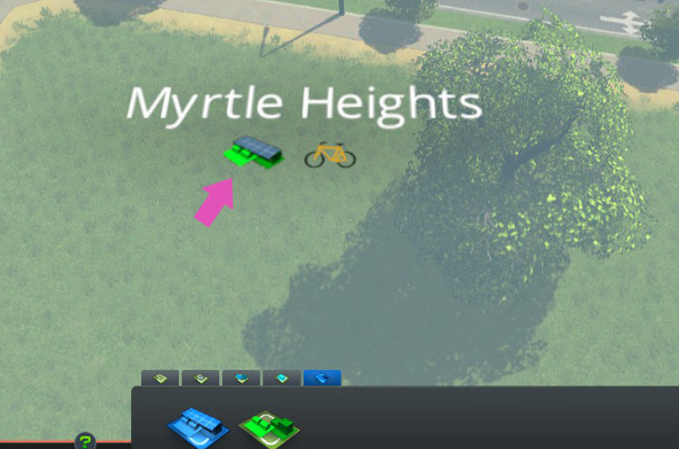 Once you see this green building icon beneath your district name, you’ll know that the self-sufficient buildings specialization has been set. / Cities: Skylines