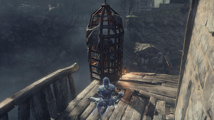 Cornyx in a cage in the Undead Settlement / DS3