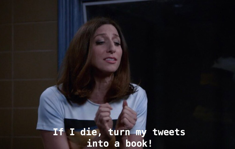 Gina Linetti tweets in a book