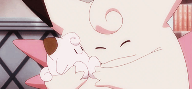 Clefable snuggling & hugging a Poke doll